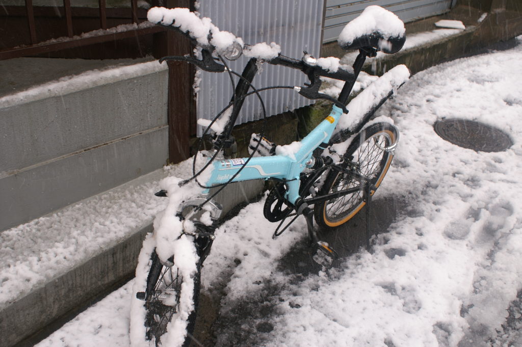 Bicycle covered in snow
