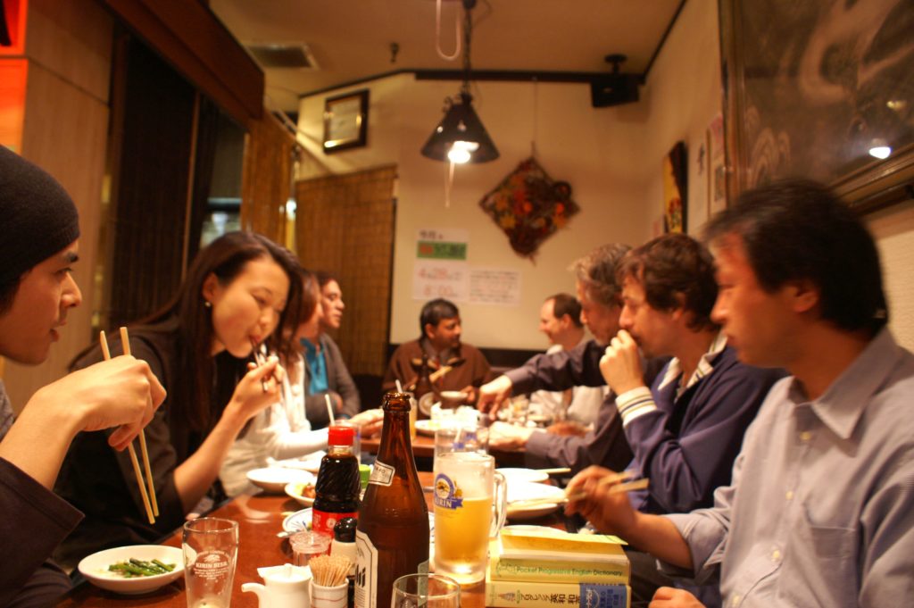 People enjoying food at the meetup