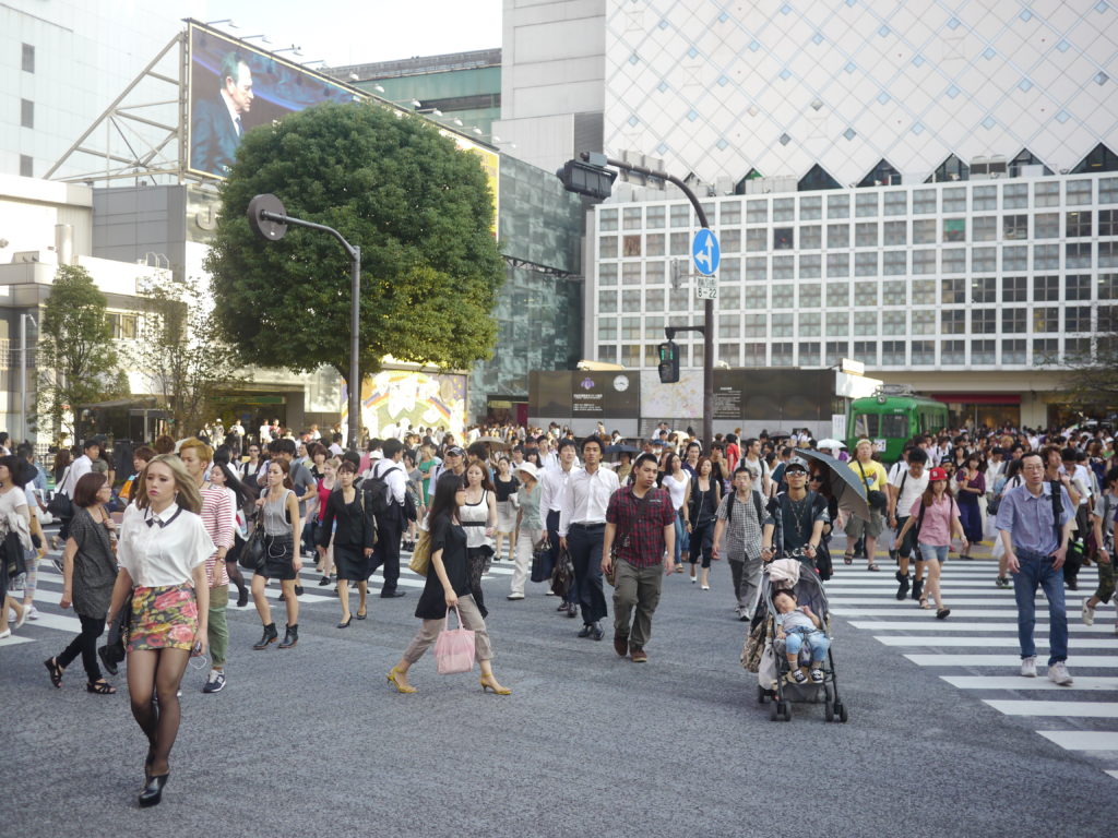 Shibuya Scramble, train in the background